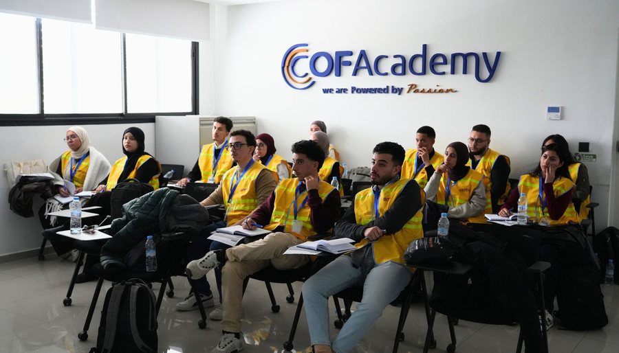 Interns in a COFAcademy training room